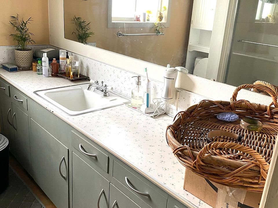 Bath with 8_ long vanity. Bath has tub/shower