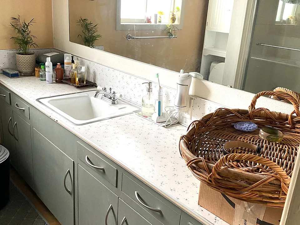 Bath with 8_ long vanity. Bath has tub/shower