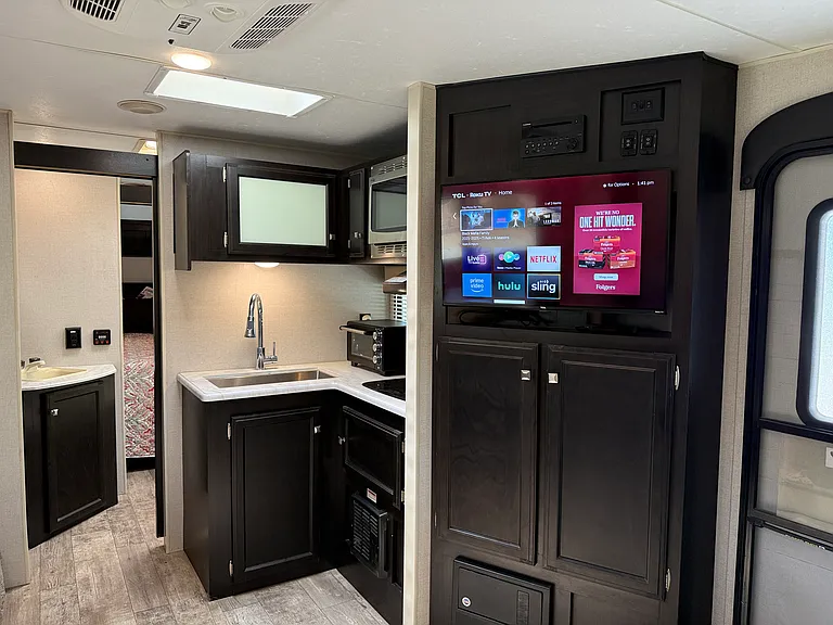 Smart TVs in Living Room and Bedroom. Additional portable fans in Living Room and Bedroom. Also nice forced air heating.