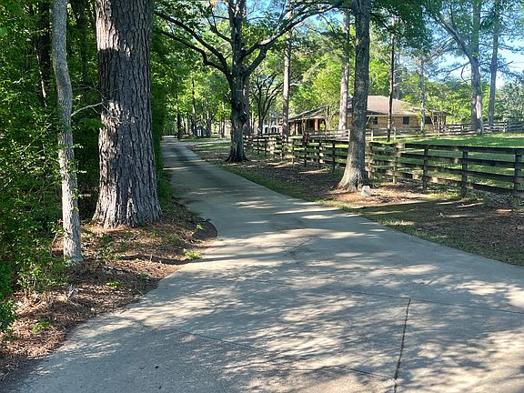 Private drive, two residents on 20 acres. country feel with no close neighbors, but convenient location just off hyw 28 in Pineville