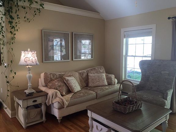 Living Room with Large Sliding Doors to Walkout Backyard