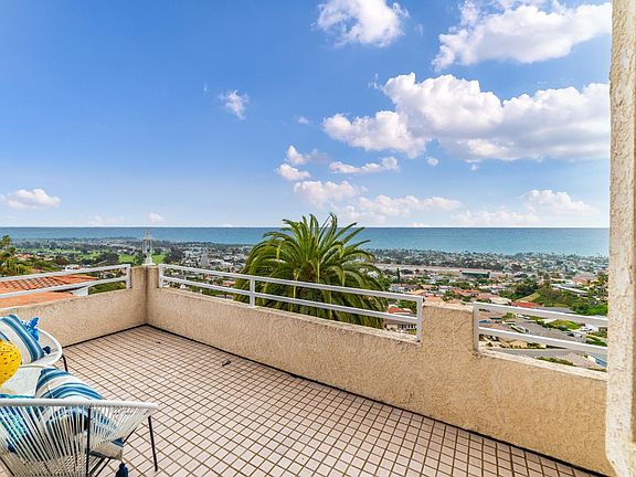 Balcony off kitchen and dining room