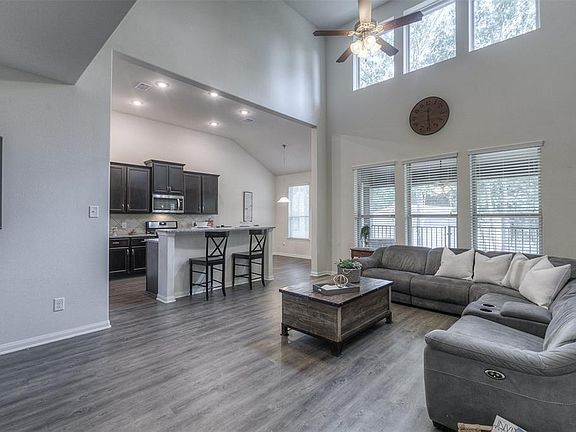 Impressive Living room with wall of windows