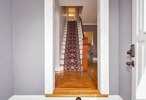 Entryway leads into foyer