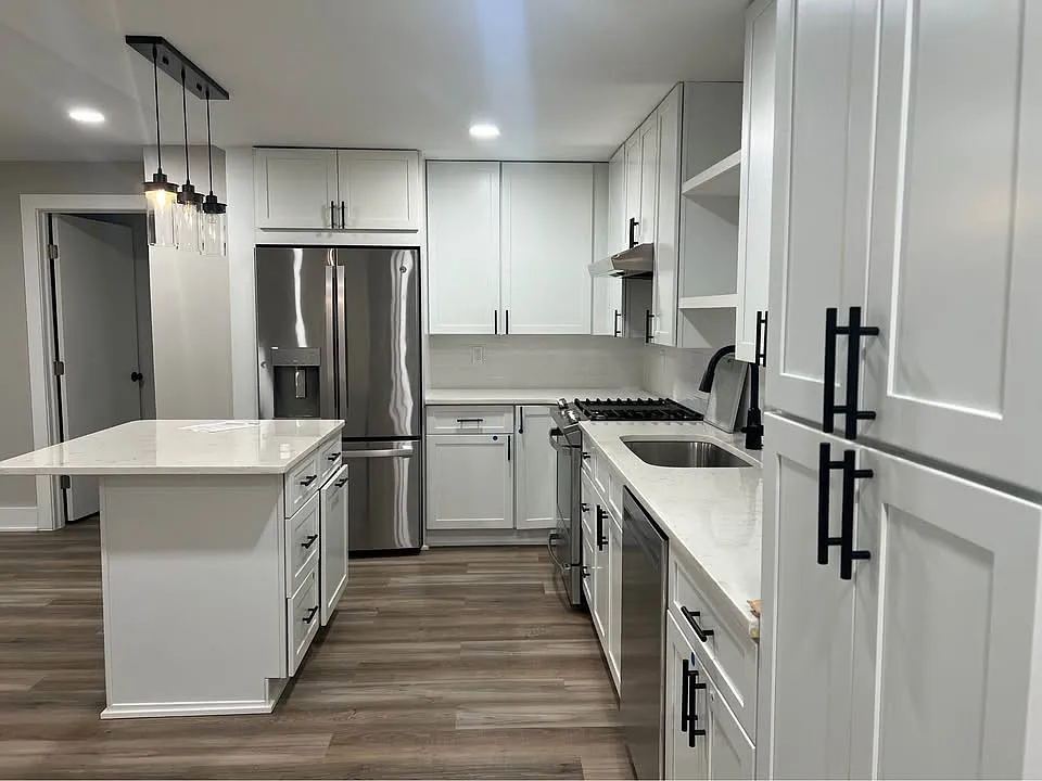 Open-concept kitchen with stainless steel appliances