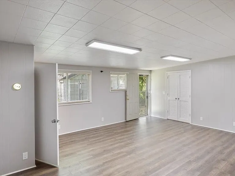 Another view of family room with half bath.