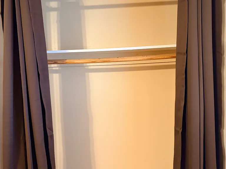 Primary bedroom closet.
