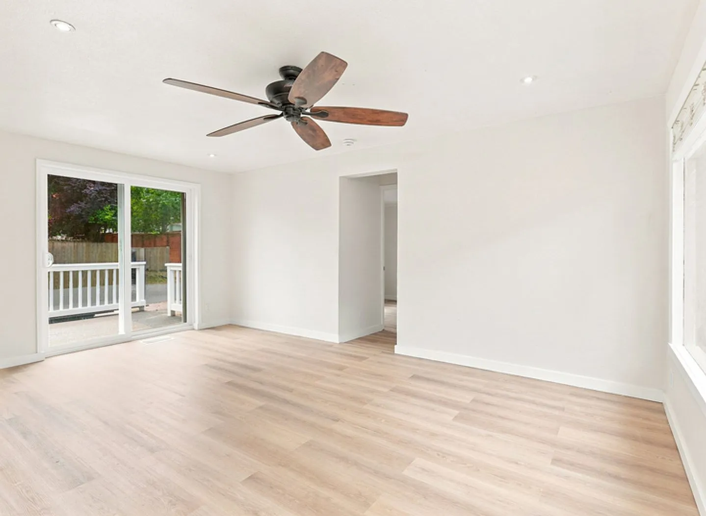 Updated Rambler with covered patio and large detached garage. — Photo 4