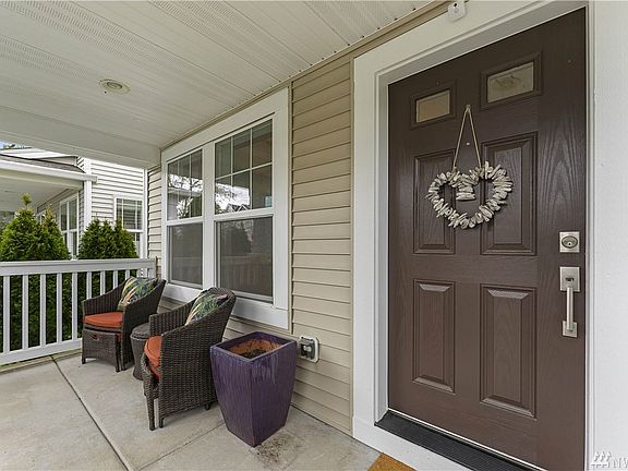 Charming Covered Front Porch.