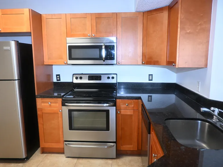 8721 Wiles Rd #305 — Photo 46