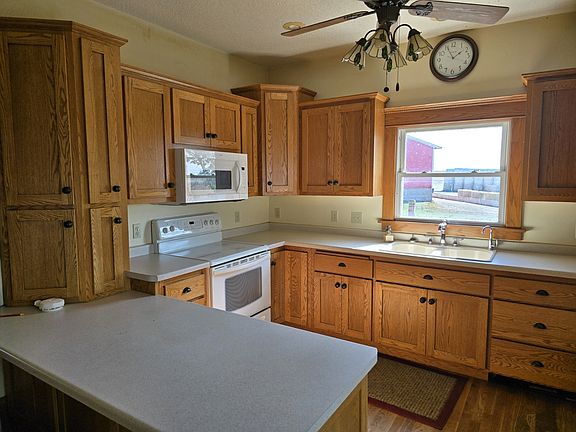 Kitchen has been remodeled with new cabinets, countertops and flooring