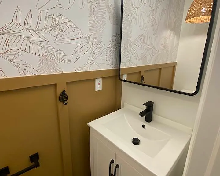 Brand New Half Bath with custom trimwork & wallpaper