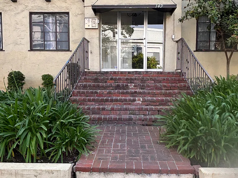 FRONT OF BUILDING, need a code to get into building