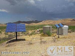 Solar panels, water tank & well house
