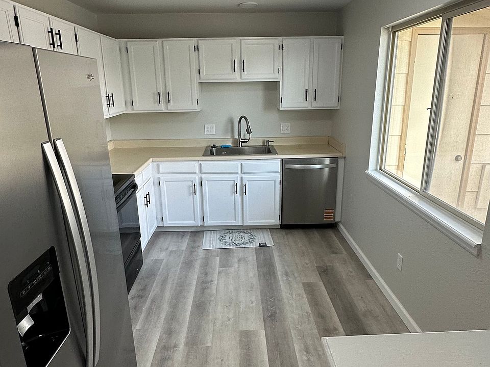 Brand New Flooring, Baseboard, Paint, and Whirlpool Dishwasher just installed with 3rd Rack