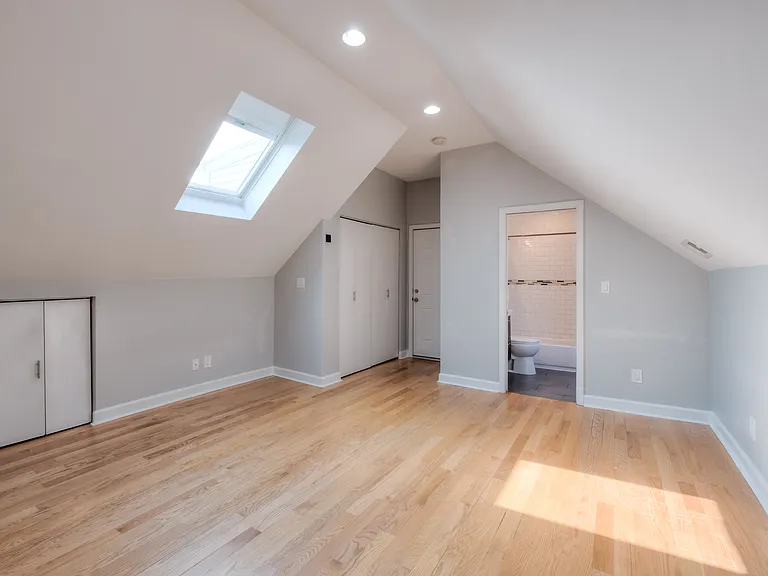 Top floor rear bedroom with skylights