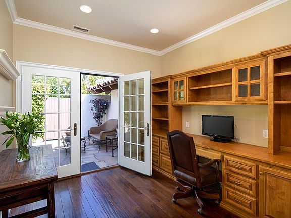 Bonus dedicated office or library with its own outdoor patio area. Perfect for working remotely or relaxing with your favorite book! Home offices and study spaces have become more important than ever!s
