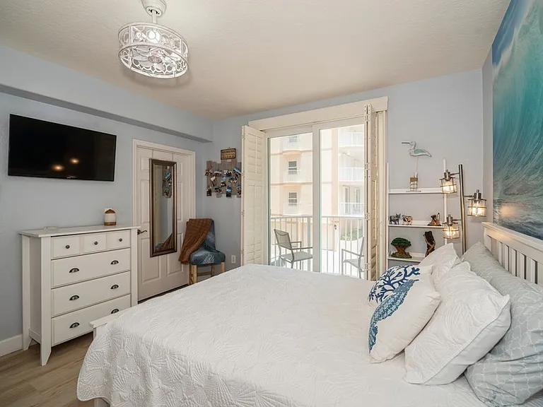 Bedroom #2 with private balcony and ocean view