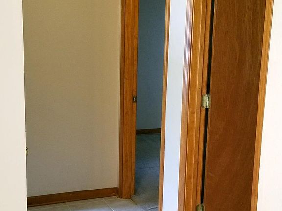 Hallway to bathroom and bedrooms.  New ceramic tile.