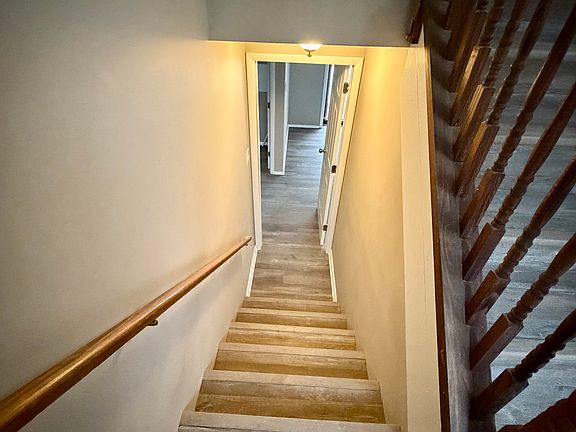 Stairwell leading to lower level living suite