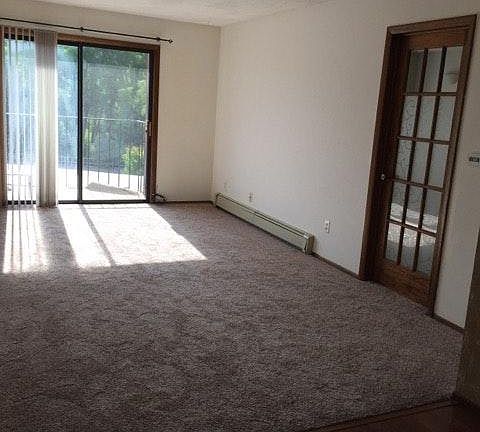 Living room; pic shows entry to master bedroom from living r