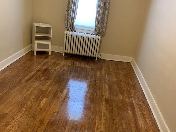 One of 2 bedrooms amazing hardwood floor