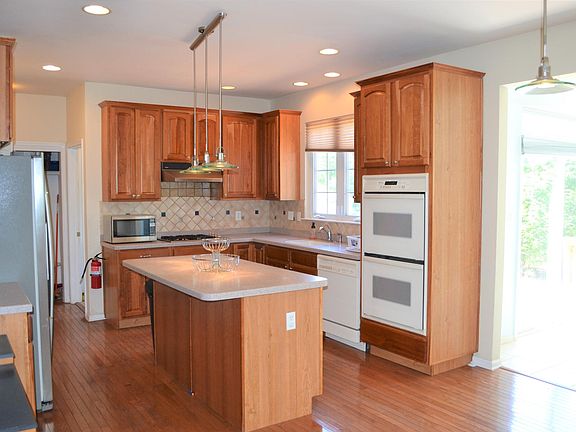 Full kitchen with cherry cabinets