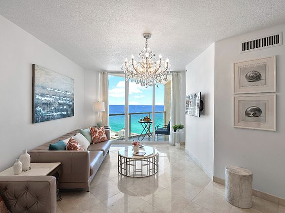 Living Room with Private Balcony.