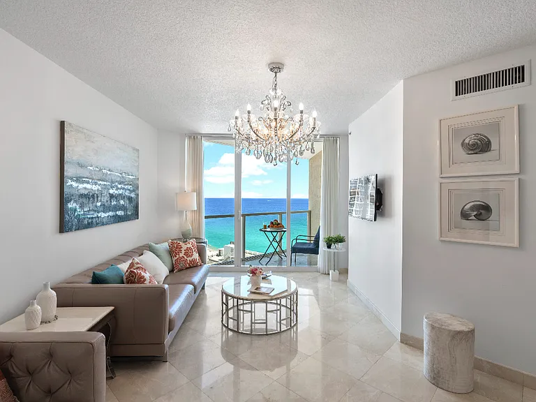 Living Room with Private Balcony.