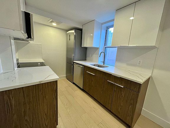 3rd image of 334 E 9th St APT 11