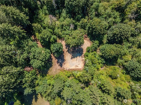 Overhead view of leveled area at top of property.>