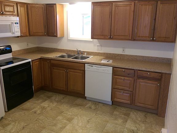 Remodeled kitchen is bright and well organized.