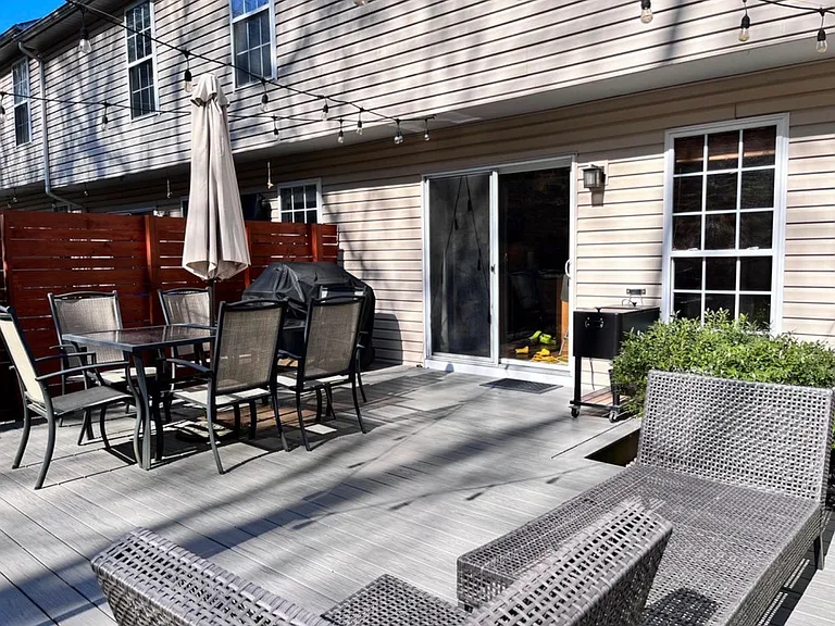 Amazing back yard with walk out deck adding a great outdoor living space.