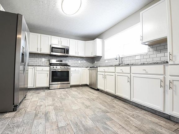 4th image of 5965 Heritage Farms Ct