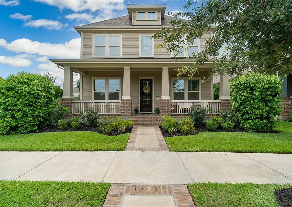 Charming Heights style 2-story home nestled on a corner lot in the master planned community of Bridgeland!