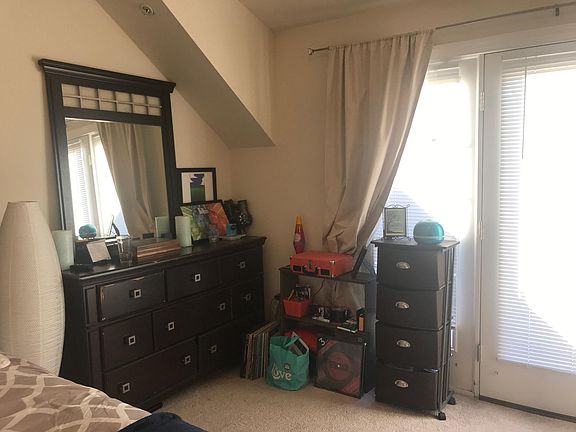 Corner of bedroom near balcony door