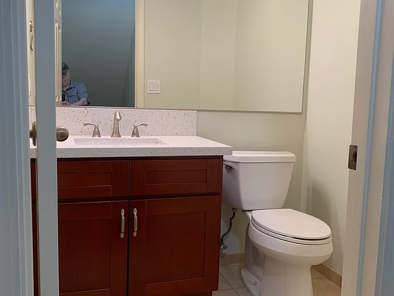 1/2 bath next to living room.
