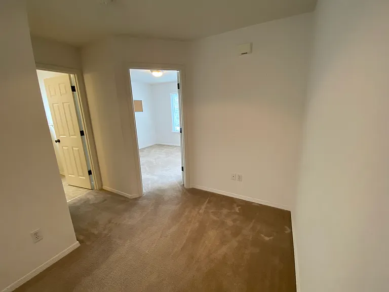Nook area, den/office and powder room entrance.