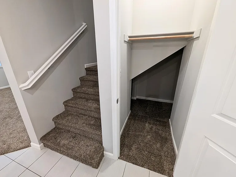 Guest closet and stairs