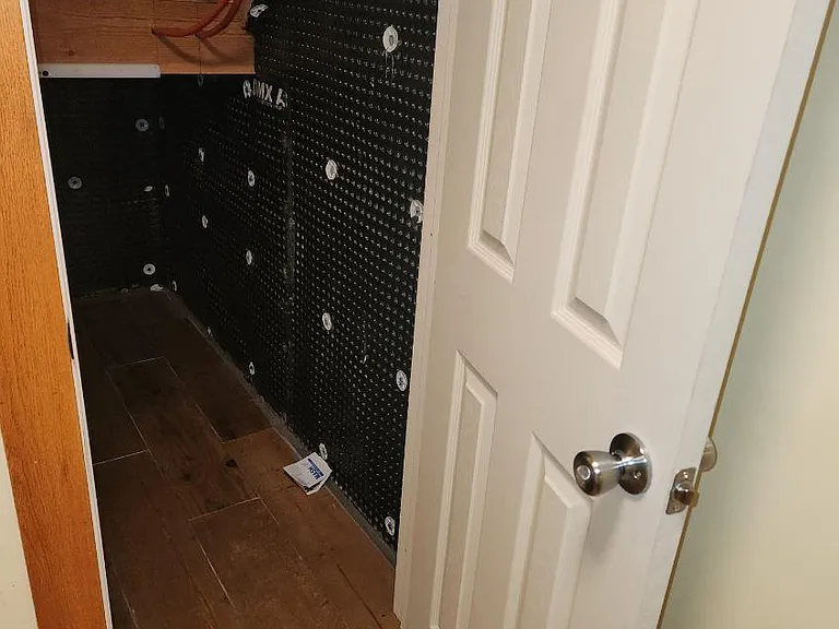 Basement storage under stairs