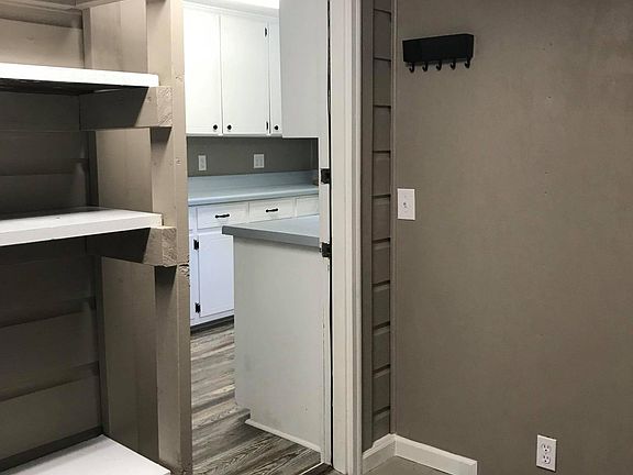 Laundry Room has washer and dryer hook ups and lots of storage.