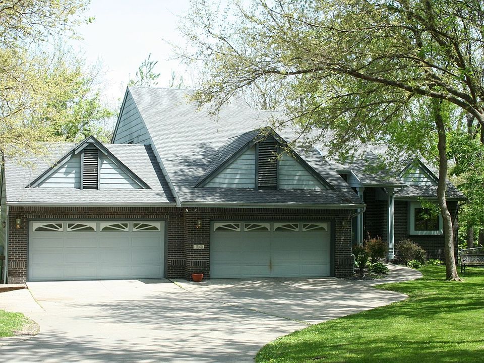4 car garage with more potential garage space in back.
