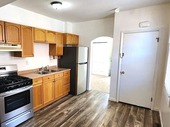 Gas range and oven. Stainless refrigerator. Beautiful hard surface floors