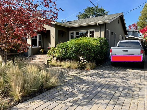 Long driveway with space for 3 cars