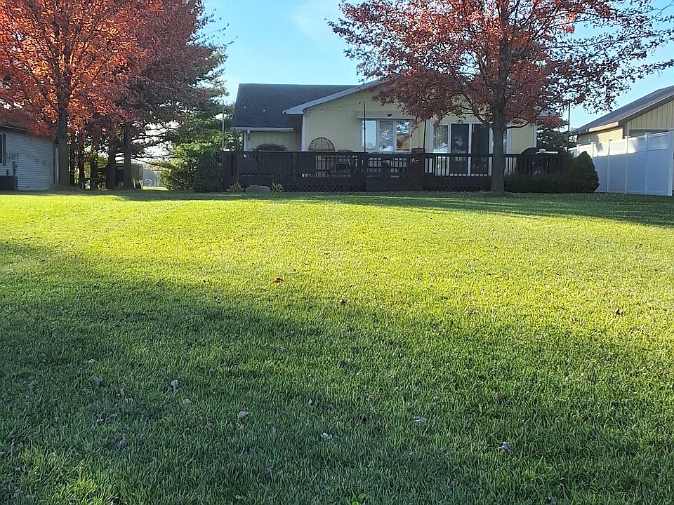 Big back yard looking at the house from the beach area