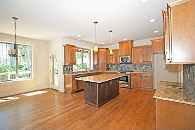 Eat in kitchen leads to the timber-tec deck.  
