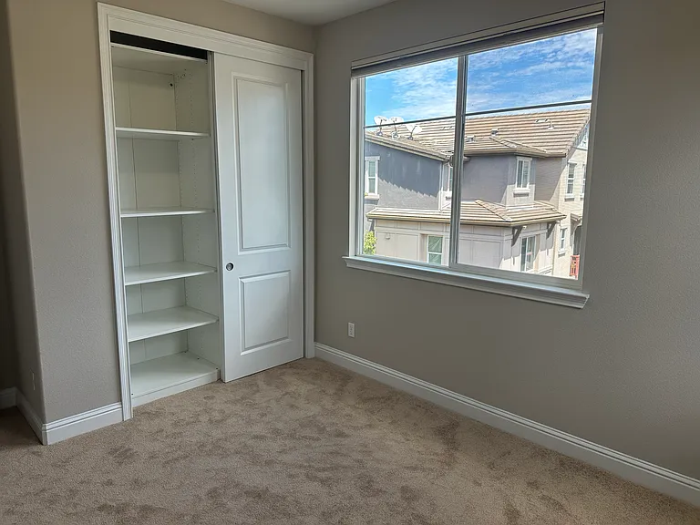 Two spacious kids bedroom on 3rd floor with ample natural light and built-in closet organization.
