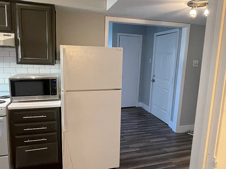View towards front entry from bathroom area.