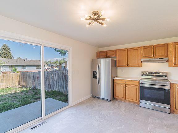 New Kitchen flooring, countertops, and appliance
