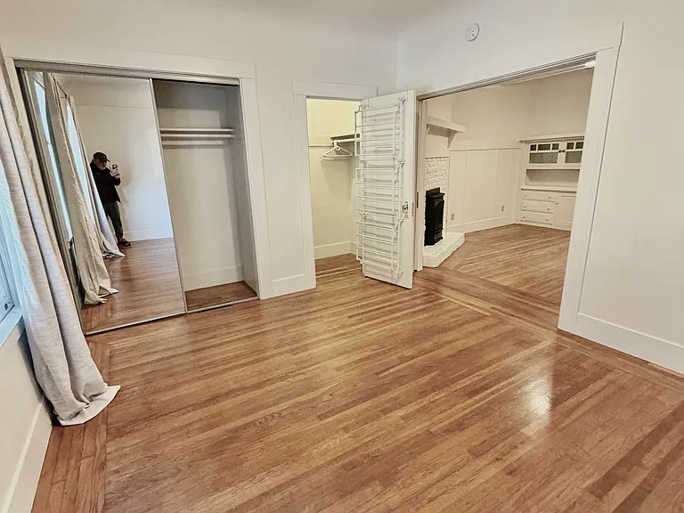 Bedroom with open pocket doors